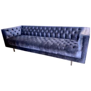 Chestera sofa featuring classic deep-button tufting,