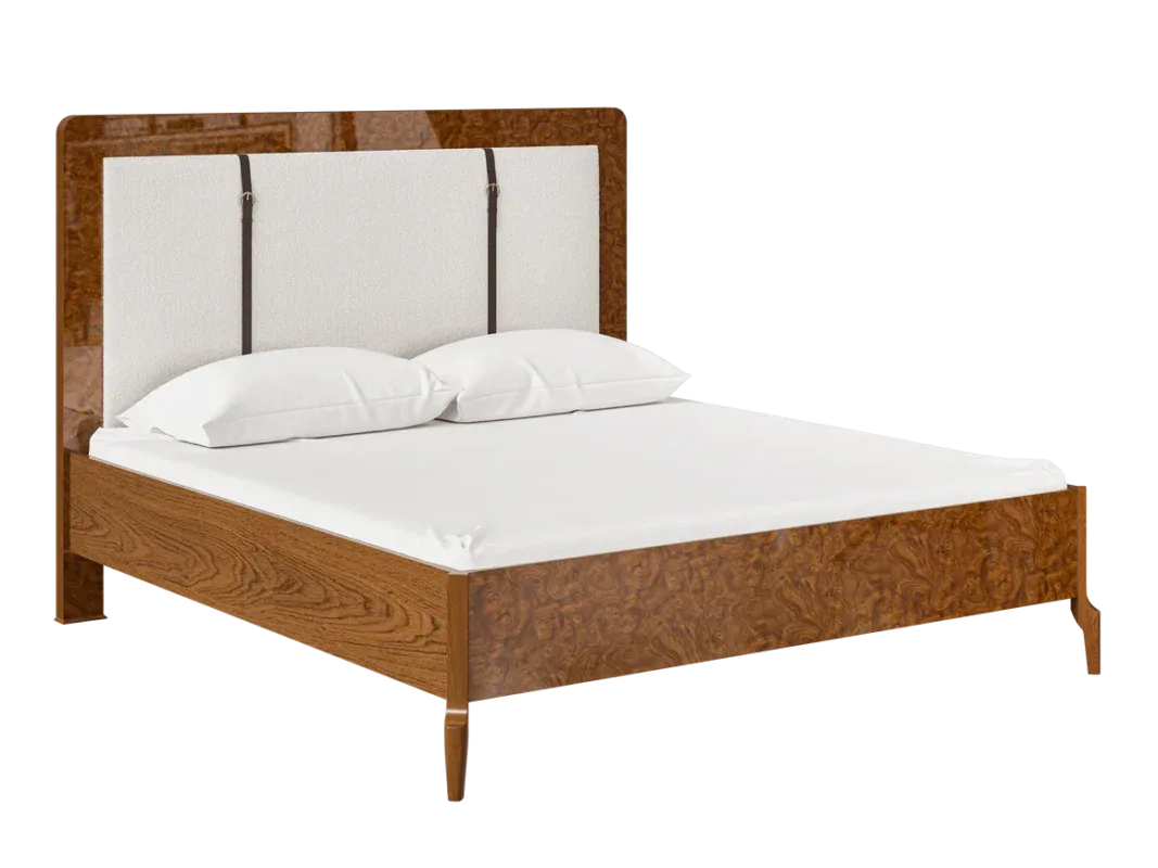 Modern wooden platform bed featuring an upholstered headboard in a luxury bedroom.