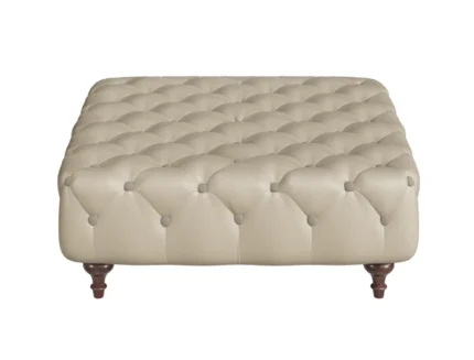 Chesterfield tufted square ottoman in a modern living room