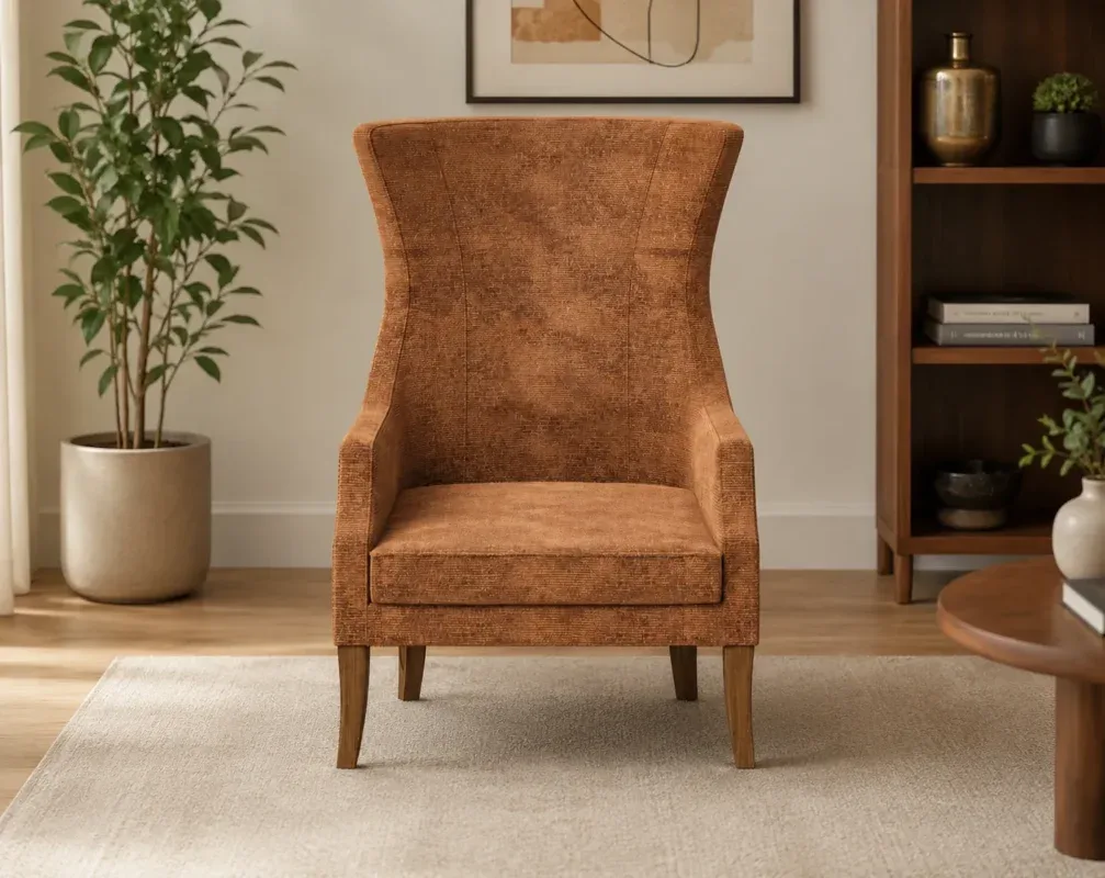Elegant upholstered lounge chair featuring a wingback design, padded seat, and textured fabric with wooden legs.