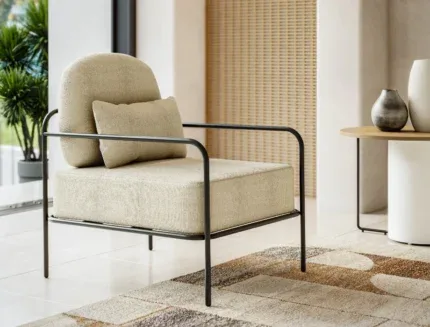 Modern upholstered lounge chair with cushioned seat and minimalist design