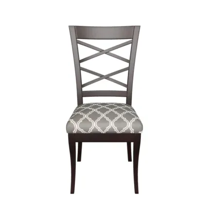 Solid wood cross-back dining chair with a patterned upholstered seat placed beside a classic wooden dining table.
