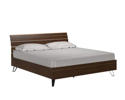 Luxury walnut wooden bed frame with modern panel headboard in an elegant bedroom.