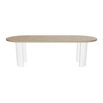 Modern oval wooden dining table with upholstered cream dining chairs.