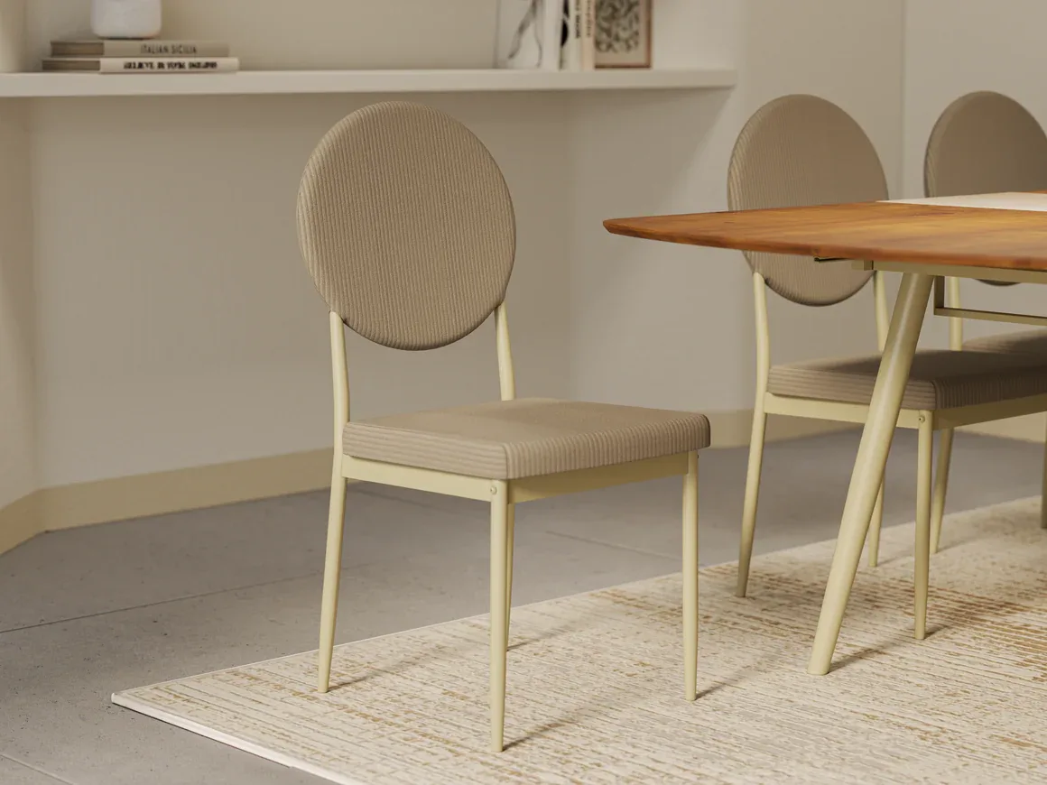 Modern Round-Back Upholstered Dining Chair | Contemporary Fabric Dining Chair Contemporary fabric dining chair featuring a circular backrest, padded seat, and minimalist metal frame in a modern dining room.