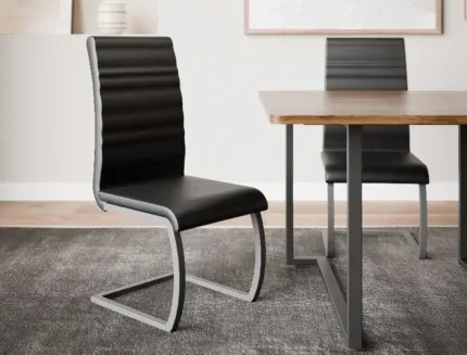 Contemporary upholstered dining chair featuring a high-back design, horizontal stitched detailing, and cantilever steel base.