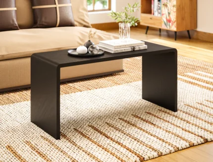 Minimalist black coffee table with curved edges