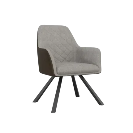 Modern upholstered dining arm chair with diamond-stitched fabric backrest, integrated armrests, and black metal legs beside a contemporary dining table.