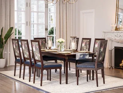 Luxury wooden dining table set with eight cushioned high-back dining chairs.