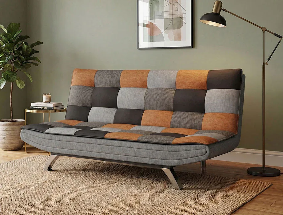 Modern patchwork fabric sofa cum bed in grey and brown with metal legs.