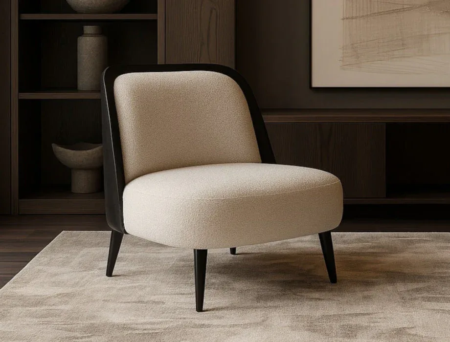Modern ivory fabric lounge chair featuring a padded seat, supportive backrest, black accent frame, and wooden leg